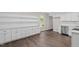 Bright and airy kitchen features white cabinets, quartz countertops, and stainless steel appliances at 2225 Whitley Dr, Durham, NC 27707