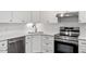 A well-appointed kitchen with subway tile backsplash and stainless steel appliances at 2225 Whitley Dr, Durham, NC 27707