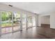 Bright living room with hardwood floors and views of outdoor area at 2225 Whitley Dr, Durham, NC 27707