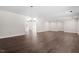 Open-concept living space features hardwood floors and neutral walls perfect for entertaining and relaxation at 2225 Whitley Dr, Durham, NC 27707
