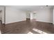 Large living room with hardwood floors and natural light at 2225 Whitley Dr, Durham, NC 27707