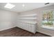 Room features built-in cabinetry with sleek countertop and bright natural light at 2225 Whitley Dr, Durham, NC 27707