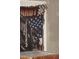 Close-up of racing-themed blanket hanging in a room; patriotism and speed converge in unique home decor at 223 Gum Ave, Spring Hope, NC 27882