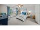 Bedroom featuring large window, stylish decor, and serene atmosphere at 226 Marquis Dr, Cameron, NC 28326
