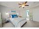 Bright bedroom with tray ceiling, plush carpet, and stylish decor at 226 Marquis Dr, Cameron, NC 28326