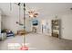 Bonus room with a TV, shelving, and play equipment, providing an engaging space for recreation and relaxation at 226 Marquis Dr, Cameron, NC 28326