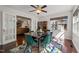 Bright dining room with French doors, hardwood floors, and stylish rug at 226 Marquis Dr, Cameron, NC 28326