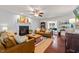 Bright living room with hardwood floors, fireplace, and stylish decor at 226 Marquis Dr, Cameron, NC 28326