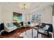 Home office featuring wainscoting, hardwood floors, and ample natural light at 226 Marquis Dr, Cameron, NC 28326