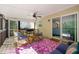 Screened porch with comfortable seating; perfect for outdoor relaxing at 226 Marquis Dr, Cameron, NC 28326