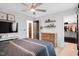 Bedroom with lots of natural light, a ceiling fan, and walk-in closet access at 2283 Grants Pass Sta, Apex, NC 27502