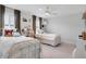 Bedroom featuring two beds with matching white frames and neutral walls and carpet, providing a serene and comfortable space at 2283 Grants Pass Sta, Apex, NC 27502