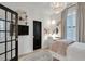 Bright bedroom with natural light and a ceiling light at 2283 Grants Pass Sta, Apex, NC 27502