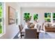 Inviting dining room featuring seating for six and windows that provide bright natural lighting at 236 Paramount Dr # 22, Smithfield, NC 27577