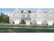 Charming townhome with a front-entry two car garage and stone accents at 236 Paramount Dr # 22, Smithfield, NC 27577