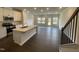 Modern kitchen featuring a center island, stainless appliances, and an open concept design for easy living at 236 Paramount Dr, Smithfield, NC 27577
