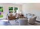 Inviting living room with comfortable seating and stylish decor, bathed in natural light at 248 Paramount Dr # 25, Smithfield, NC 27577