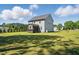 Spacious backyard features a screened in porch and ample green space, perfect for outdoor activities at 263 Annali Way, Wendell, NC 27591