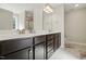 Modern bathroom with dual vanities, spacious countertop, and well-lit mirrors, creating an inviting space at 263 Annali Way, Wendell, NC 27591