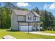 Well-maintained two-story home with vinyl siding, attached garage and a basketball hoop at 263 Annali Way, Wendell, NC 27591