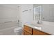 Bright bathroom featuring a white vanity, tub/shower combo, and a window for natural light at 269 Sweet Bay Pl, Carrboro, NC 27510