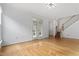 Open-concept living area with hardwood floors, neutral walls, and access to outdoor space at 269 Sweet Bay Pl, Carrboro, NC 27510