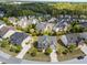 Beautiful aerial view of a neighborhood with well-maintained lawns and mature trees in a desirable location at 316 Hilliard Forest Dr, Cary, NC 27519