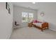 Cozy bedroom with a bed, window and carpet flooring at 316 Hilliard Forest Dr, Cary, NC 27519