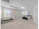Expansive bedroom with a tray ceiling and plenty of room for a Bedroom and sleeping area at 316 Hilliard Forest Dr, Cary, NC 27519