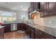 Well-equipped kitchen with granite countertops, stainless steel appliances, and ample cabinet space at 316 Hilliard Forest Dr, Cary, NC 27519