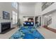 Spacious living room with fireplace, hardwood floors, and open access to the kitchen at 316 Hilliard Forest Dr, Cary, NC 27519