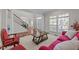 Inviting living room featuring neutral carpet, multiple windows, and comfortable seating at 316 Hilliard Forest Dr, Cary, NC 27519