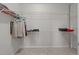 Spacious walk-in closet with multiple levels of metal shelving and carpet flooring at 316 Hilliard Forest Dr, Cary, NC 27519