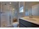 This bathroom features a shower and gray vanity at 3205 Silver Ore Ct, Wake Forest, NC 27587