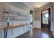 Welcoming foyer with hardwood floors, elegant decor, and views into other rooms at 3205 Silver Ore Ct, Wake Forest, NC 27587