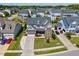 Charming two-story home featuring a well-manicured lawn, a two-car garage, and a welcoming front porch at 3205 Silver Ore Ct, Wake Forest, NC 27587