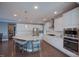 Spacious kitchen with granite counters, stainless steel appliances, and center island with seating at 3205 Silver Ore Ct, Wake Forest, NC 27587