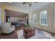 Bright open concept living room with hardwood floors and views into the modern kitchen at 3205 Silver Ore Ct, Wake Forest, NC 27587