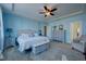 This primary bedroom features light blue walls and trim at 3205 Silver Ore Ct, Wake Forest, NC 27587