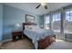 Comfortable primary bedroom with a ceiling fan, recessed lighting, and large windows at 3205 Silver Ore Ct, Wake Forest, NC 27587