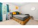 Cozy bedroom with a comfortable bed, soft carpet, and a window with natural light at 329 Cartwright Cir, Wendell, NC 27591