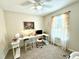 Cozy bedroom or office space with natural light, a desk setup, and comfortable furnishings at 334 Cabin Grove Ct, Angier, NC 27501