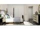 Comfortable bedroom showcasing a dark wood dresser, neutral bedding, and ample closet space at 336 Carolina Springs Blvd, Apex, NC 27539