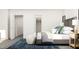 Spacious main bedroom featuring a cozy armchair and stylish furniture at 336 Carolina Springs Blvd, Apex, NC 27539