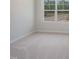 Bedroom highlighting a large window allowing natural light at 373 Thompson Overlook Way # 233, Smithfield, NC 27577