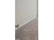 Bedroom featuring neutral carpet, baseboards, and a wall outlet at 373 Thompson Overlook Way # 233, Smithfield, NC 27577