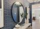 Entryway featuring a large mirror, decor, and modern geometric wallpaper at 373 Thompson Overlook Way # 233, Smithfield, NC 27577