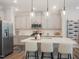 Modern kitchen with stainless steel appliances and a center island at 373 Thompson Overlook Way # 233, Smithfield, NC 27577