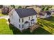Two-story home exterior features a wood deck and yard at 3809 Long Meadow Dr, Mebane, NC 27302