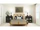 Bright bedroom with neutral tones, showcasing a decorative headboard and modern lighting for a tranquil retreat at 385 Thompson Overlook Way # 236, Smithfield, NC 27577